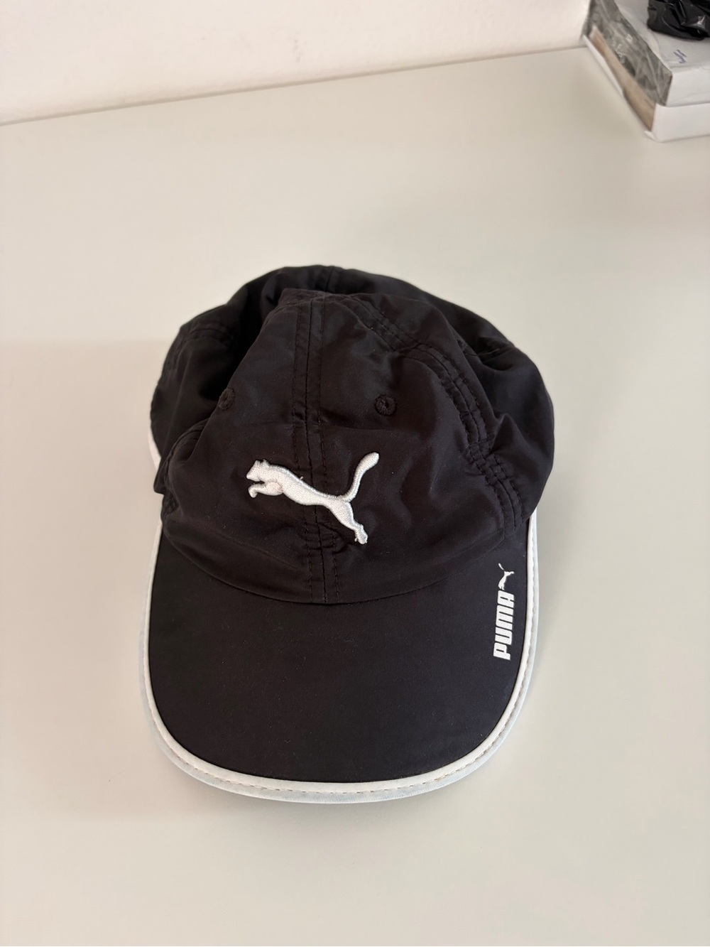 Puma Kids Black Cap with White Logo and Trim